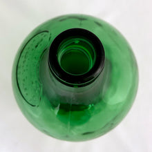 Load image into Gallery viewer, Vintage mold blown green glass demijohn. Impressed into the glass is Darrigo's Grape Juice Limited, 90 Caledonia Park R., 763 2207. Darrigo's is a decades old grape juice company in Toronto Canada. The bottle was made in Italy, 1970s. A great decorative piece or vase to brighten up your home decor
In excellent condition, free from chips/cracks.
Measures 6 x 6 x 11 inches
Capacity 3 quarts
