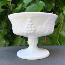 Load image into Gallery viewer, Vintage Harvest grape vines white milk glass sherbet dish or tall champagne glass with underplate. Crafted by Indiana Glass, USA, 1970s. Perfect for serving desserts or champagne!
In excellent condition, no chips.
Sherbet measures 4 x 3 1/8 inches, plate measures 6 1/4 inches
