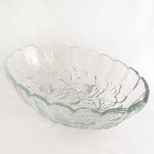 Load image into Gallery viewer, This vintage clear pressed glass oval shaped footed bowl in the "Harvest Grape" pattern has a lovely scalloped edge and is perfect vessel to hold your favourite fruits. Produced by the Indiana Glass Company, USA, circa 1970. Makes a fabulous centrepiece, buffet or counter display. In excellent condition, free from chips/cracks. Measures 12 x 8 1/2 x 4 1/2 inches