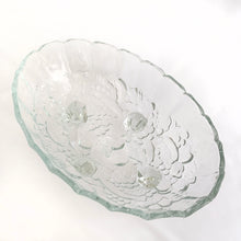 Load image into Gallery viewer, This vintage clear pressed glass oval shaped footed bowl in the "Harvest Grape" pattern has a lovely scalloped edge and is perfect vessel to hold your favourite fruits. Produced by the Indiana Glass Company, USA, circa 1970. Makes a fabulous centrepiece, buffet or counter display. In excellent condition, free from chips/cracks. Measures 12 x 8 1/2 x 4 1/2 inches