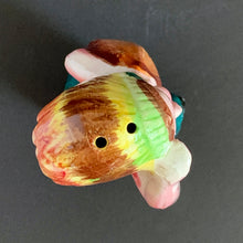 Load image into Gallery viewer, This little First Nations (Native American Indian) shaker is adorably kitschy. He is single and ready to mingle! He's a bit on the peppery side and is looking for a salty companion. Available for all meals. Cork is inside (oops). Made in Japan. The pottery is in excellent condition, no chips or cracks. Extremely nicely glazed, colours are vibrant. Measures 2 1/2 x 2 x 4 inches