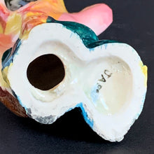 Load image into Gallery viewer, This little First Nations (Native American Indian) shaker is adorably kitschy. He is single and ready to mingle! He's a bit on the peppery side and is looking for a salty companion. Available for all meals. Cork is inside (oops). Made in Japan. The pottery is in excellent condition, no chips or cracks. Extremely nicely glazed, colours are vibrant. Measures 2 1/2 x 2 x 4 inches