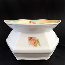 Load image into Gallery viewer, Vintage hexagon-shaped porcelain ladies spittoon, decorated with sprays of beautiful peach roses in a six sided shape. Marked Germany. Early 20th century. Repurpose this piece into a stunning vessel for a houseplant. In good vintage condition, with 1 minor chip to the rim which is barely noticeable. Dimensions: 7-1/4" x 4"