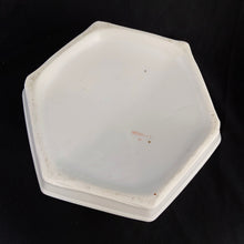 Load image into Gallery viewer, Vintage hexagon-shaped porcelain ladies spittoon, decorated with sprays of beautiful peach roses in a six sided shape. Marked Germany. Early 20th century. Repurpose this piece into a stunning vessel for a houseplant. In good vintage condition, with 1 minor chip to the rim which is barely noticeable. Dimensions: 7-1/4" x 4"