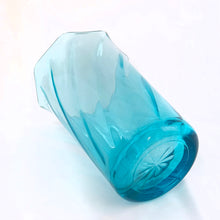 Load image into Gallery viewer, Vintage Moroccan capri optic glass flared vase with ruffled edge. Crafted by Hazel-Atlas Glass, USA, 1940s - 1960s. Fill this lovely vase with a beautiful floral arrangement. It would make it a stunning hostess gift filled with a beautiful bouquet!
In excellent condition, no chips, minor wear.
Measures 3 5/8 (base) 6 1/2 (rim) x 8 3/8 inches (tall)