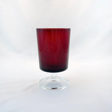 Load image into Gallery viewer, Set of six, vintage Cavalier wine glasses in a luscious deep ruby red with clear footed stems. Made by Cristal D'Arques-Durand, France, 1970s.
In excellent condition, no chips. Marked France on the bottom.
Measures 2 1/2 x 4 1/2 inches
Capacity 6 ounces