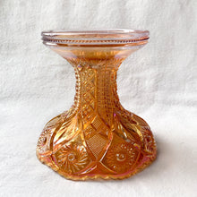 Load image into Gallery viewer, Vintage Hobstar Arches Twins brilliant cut marigold carnival glass punch bowl stand. Crafted by Imperial Glass, USA, 1940s. This iridescence is stunning! Use to support its matching bowl, or repurpose as a candy dish or candle holder.
Excellent vintage condition, no chips.
Measures 5 1/2 x 5 1/2 inches