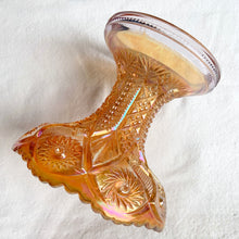 Load image into Gallery viewer, Vintage Hobstar Arches Twins brilliant cut marigold carnival glass punch bowl stand. Crafted by Imperial Glass, USA, 1940s. This iridescence is stunning! Use to support its matching bowl, or repurpose as a candy dish or candle holder.
Excellent vintage condition, no chips.
Measures 5 1/2 x 5 1/2 inches