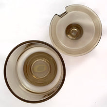 Load image into Gallery viewer, Vintage modernist Joe Colombo smokey brown glass lidded sugar. Crafted by Arno, Italy, 1960s. These pieces have a sleek geometric design with a silhouette that makes the contents in this pressed glass appear suspended above the table surface.
In excellent condition, no chips or cracks. Marked ITALY.
Measures 3 3/8 x 3 3/8 x 3 3/8 inches