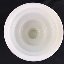 Load image into Gallery viewer, Versatile vintage milk glass pedestal candle holder, features a embossed swirl detail. May be used with several sized candles including taper, 2" votive, 3" pillar and 4" pillar, with the reverse side perfect for a round candle.
In excellent condition, no chips. Unmarked.
Measures 4 3/8 x 3 3/8 inches
