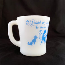 Load image into Gallery viewer, Vintage Fire-King milk glass D-handled mug printed in blue with seated children saying mealtime prayer while their mom serves them with puppy and bird observing. The prayer reads, "I fold my hands and bow my head To thank Thee for my daily bread". Produced by Anchor Hocking Glass Co., USA. In excellent condition, no chips or cracks. Measures 3 1/4 x 3 3/8 inches