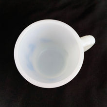 Load image into Gallery viewer, Vintage Fire-King milk glass D-handled mug printed in blue with seated children saying mealtime prayer while their mom serves them with puppy and bird observing. The prayer reads, "I fold my hands and bow my head To thank Thee for my daily bread". Produced by Anchor Hocking Glass Co., USA. In excellent condition, no chips or cracks. Measures 3 1/4 x 3 3/8 inches