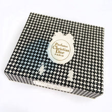 Load image into Gallery viewer, Vintage full 2 ounce bottle of 'Miss Dior' eau de toilette in gift box. Created by perfumer François Demachy for Christian Dior, Paris France. As Dior's debut fragrance, Miss Dior was introduced in 1947 alongside the first Christian Dior collection in Paris at 30 Avenue Montaigne.