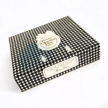 Load image into Gallery viewer, Vintage full 2 ounce bottle of 'Miss Dior' eau de toilette in gift box. Created by perfumer François Demachy for Christian Dior, Paris France. As Dior's debut fragrance, Miss Dior was introduced in 1947 alongside the first Christian Dior collection in Paris at 30 Avenue Montaigne.