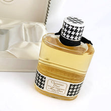 Load image into Gallery viewer, Vintage full 2 ounce bottle of 'Miss Dior' eau de toilette in gift box. Created by perfumer François Demachy for Christian Dior, Paris France. As Dior's debut fragrance, Miss Dior was introduced in 1947 alongside the first Christian Dior collection in Paris at 30 Avenue Montaigne.
