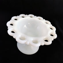 Load image into Gallery viewer, Vintage Old Colony milk glass pedestal compote features an open lace edge. Crafted by Anchor Hocking, 1950 - 1970s. This compote can be used for candy, nuts or in combination with a flower frog for a beautiful flower arrangement or as a trinket or soap dish.
In excellent condition, no chips.
Measures 5 1/4 x 3 1/8 inches