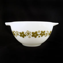 Load image into Gallery viewer, Fabulous find in this vintage PYREX "Spring Blossoms Green I" or commonly known as "Crazy Daisy" white milk glass Cinderella bowl with green daisy flowers on this 441, 1-1/2 pint beauty! Produced by Corning USA, first between 1972 to 1979 and again between 1979 to 1981. In excellent condition, no chips or cracks. Looks like it hasn't seen a dishwasher and the pattern in shiny and vibrant. Measures 7-1/2" x 3-1/8" (handle-handle)