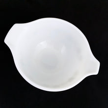 Load image into Gallery viewer, Fabulous find in this vintage PYREX "Spring Blossoms Green I" or commonly known as "Crazy Daisy" white milk glass Cinderella bowl with green daisy flowers on this 441, 1-1/2 pint beauty! Produced by Corning USA, first between 1972 to 1979 and again between 1979 to 1981. In excellent condition, no chips or cracks. Looks like it hasn't seen a dishwasher and the pattern in shiny and vibrant. Measures 7-1/2" x 3-1/8" (handle-handle)