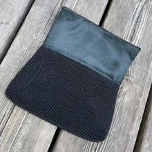 Load image into Gallery viewer, This is one of the nicest, well-cared for and preserved mid-century glass seed beaded evening clutch purses we've encountered. It has a stunning hand sewn beadwork, a black satin interior lining and a nifty pinch/squeeze closure. A super glam piece of vintage fashion! Made in Hong Kong and imported by Aristo. The beading and interior satin are in mint condition. Measures 7-1/4" x 4-5/8"
