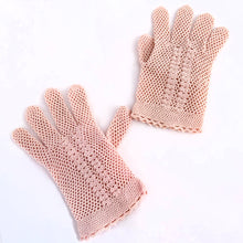 Load image into Gallery viewer, This is a stunning pair of vintage blush pink crochet gloves with a beautiful lace crochet detailed pattern on the back of the hand and at the cuff. Made with impeccable craftsmanship. Their light and breathable design make them perfect for a spring or summer occasion. These have a somewhat stretchy property making them easier to fit over the hand.