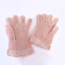 Load image into Gallery viewer, This is a stunning pair of vintage blush pink crochet gloves with a beautiful lace crochet detailed pattern on the back of the hand and at the cuff. Made with impeccable craftsmanship. Their light and breathable design make them perfect for a spring or summer occasion. These have a somewhat stretchy property making them easier to fit over the hand.