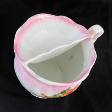 Load image into Gallery viewer, This vintage white porcelain shaving mug has with lovely pink and yellow roses with gold rim. Use as intended or repurpose as a toothbrush or make-up brush holder. Stamped "Welmar Germany". In excellent condition, no chips/cracks/repairs. Dimensions: 3-3/8" x 3-1/2"