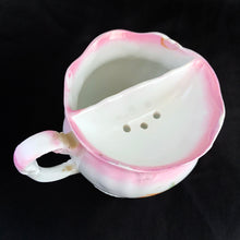 Load image into Gallery viewer, This vintage white porcelain shaving mug has with lovely pink and yellow roses with gold rim. Use as intended or repurpose as a toothbrush or make-up brush holder. Stamped "Welmar Germany". In excellent condition, no chips/cracks/repairs. Dimensions: 3-3/8" x 3-1/2"