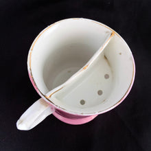 Load image into Gallery viewer, Vintage wood handled shaving brush and white porcelain shaving mug with raised slip details painted in pink, yellow and blue, highlighted in gold. Use as intended or repurpose as a toothbrush or make-up brush holder. Impressed mark "510" and painted "13". In good vintage condition, no cracks/repairs. The edge on the soap side is worn. Dimensions: 3-1/8" x 3"