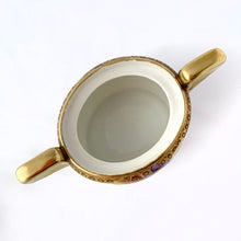 Load image into Gallery viewer, Elegant and beautifully hand painted antique porcelain oval-shaped covered sugar bowl with purple violet flowers with gold moriage details. Crafted by Maruki Noritake, Japan, early 20th century, 1906 to 1925. A gorgeous piece to add to your tableware collection!
In excellent condition no chips/cracks/repairs, minor wear to the gold, see photos. Marked on the bottom.
Measures 3 x 3 3/8 x 3 1/2 inches
