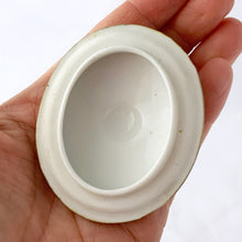 Load image into Gallery viewer, Elegant and beautifully hand painted antique porcelain oval-shaped covered sugar bowl with purple violet flowers with gold moriage details. Crafted by Maruki Noritake, Japan, early 20th century, 1906 to 1925. A gorgeous piece to add to your tableware collection!
In excellent condition no chips/cracks/repairs, minor wear to the gold, see photos. Marked on the bottom.
Measures 3 x 3 3/8 x 3 1/2 inches