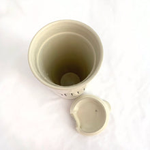 Load image into Gallery viewer, Authentic Rae Dunn Artisan Collection ceramic COFFEE travel tumbler. Crafted by Magenta 214. Perfect for those long commutes or country drives. In excellent condition, no chips or cracks. Measures 3 1/2 x 6 1/4 inches