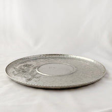 Load image into Gallery viewer, Beautiful hammered aluminum serving tray with embossed tulip design on shape #460. Crafted by Rodney Kent in Brooklyn, New York USA, circa 1950s. This tray would look stunning on a bar cart or pair with a bowl for serving appetizers with dip. In excellent condition. Makers mark on bottom. Measures 11 1/4 x 1/2 inches