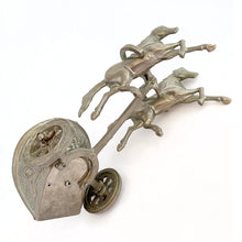 Load image into Gallery viewer, Unique and highly collectible vintage mid-century Roman horse drawn chariot table light made with cast silver-toned metal with chrome lighter. Definitely a conversation piece! Chariot swivels, but we're unsure whether or not it's a flaw. Otherwise in great vintage condition with nice patina. Lighter needs flint and lighter fluid or butane post-shipping. Unmarked. Measures 7-1/2" x 3-1/2" x 3-1/4"