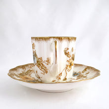 Load image into Gallery viewer, Antique Victorian style "Rutland" demitasse cup and saucer, with blue and yellow flowers trimmed in gold gilt. Crafted by Doulton Burslem, Staffordshire England, circa 1891 - 1902. An absolutely stunning addition to your teacup collection! In excellent condition, free from chips/cracks/repairs. Makers marks present. Cup measures 2 1/8 x 2 1/8 inches and saucer is approximately 4 inches
