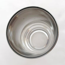 Load image into Gallery viewer, Mid-century vintage silver fade highball glasses are perfect for any occasion! These are decorated with a silver top that fades down to clear glass. Crafted by Vitreon Queen's Lustreware 1960s. These will certainly add some vintage glamour to your bar cart!
In excellent condition, no chips.
Measures 2 1/4 x 3 1/2 inches
Capacity 5 ounces