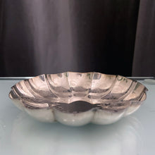 Load image into Gallery viewer, Sweet vintage silver plate scalloped shaped dish beautifully engraved with a pattern of shells and hearts. Marked EP Copper along with a shield with an "R" for Roden Bros. Ltd. The perfect piece to brighten up a vanity table to hold trinkets, in a powder room to display fancy soaps or in an entryway filled with treats. In good vintage condition. Measures 4" x 1/2"