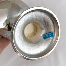 Load image into Gallery viewer, This vintage silver plated sugar scuttle and scoop set, embossed with roses, flowers, leaves and scroll details No 540. It's just a beautiful vessel for sugar cubes or bath salts. Produced by Leonard Manufacturing Ltd. in Japan. In good vintage condition. In original box. Measures approx. 6-1/4" x 3.5" x 6"