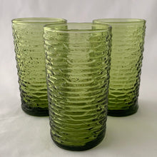 Load image into Gallery viewer, Vintage pressed glass avocado green "Soreno" highball glass tumbler. A great colour with a textured bark-like surface to add to your tableware. Produced by Anchor Hocking between 1966–1970. In excellent condition, no chips or cracks. Measures 2 3/4 x 5 inches Capacity 12 ounces