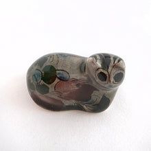 Load image into Gallery viewer, Vintage miniature Tonala folk art pottery cat figurine in gray with a nicely detailed face in black and brown with the body in pink, black and green florals. Crafted in Mexico, 1960s. A sweet piece to add to your collection!
In excellent condition, no chips or cracks. Signed MEX.
Measures 1 1/4 x 3/4 x 1 5/8 inches