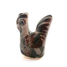 Load image into Gallery viewer, Vintage miniature Tonala folk art pottery rooster bird figurine, hand painted in gray with a nicely detailed face in black and brown with the body in pink, black and green florals. Crafted in Mexico, 1960s. A sweet piece to add to your collection!
In excellent condition, no chips or cracks. Signed MEX.
Measures approximately 1 1/4 x 3/4 x 1 5/8 inches