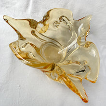 Load image into Gallery viewer, A stunning 3 point trillium shaped yellow art glass ashtray or bowl. This is a beautifully hand blown glass ashtray with lots of twists and turns of the glass. Makes a beautiful addition to home decor. Use as trinket dish, catchall, candy dish or as originally intended. Made by Lorraine Glass in Canada, circa 1970. It is absolutely spectacular piece of art glass! In excellent condition, no chips or cracks and the bottom is polished smooth. Measures 9" x 3-7/8"