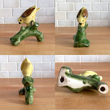 Load image into Gallery viewer, Pretty set of hand painted vintage ceramic yellow birds perched on green branches. I believe this is a Laysan or Hawaiian Finch. Marked with an 'R' on the bottom. Excellent condition, no chips or cracks. Bird A: 4" x 1.75" x 4" Bird B: 2.5" x 2" x 5" Bird C: 2.5" x 2" x 5"