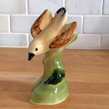 Load image into Gallery viewer, Pretty set of hand painted vintage ceramic yellow birds perched on green branches. I believe this is a Laysan or Hawaiian Finch. Marked with an 'R' on the bottom. Excellent condition, no chips or cracks. Bird A: 4" x 1.75" x 4" Bird B: 2.5" x 2" x 5" Bird C: 2.5" x 2" x 5"