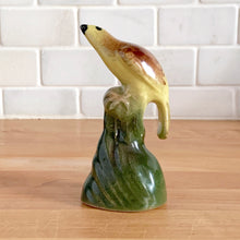 Load image into Gallery viewer, Pretty set of hand painted vintage ceramic yellow birds perched on green branches. I believe this is a Laysan or Hawaiian Finch. Marked with an 'R' on the bottom. Excellent condition, no chips or cracks. Bird A: 4" x 1.75" x 4" Bird B: 2.5" x 2" x 5" Bird C: 2.5" x 2" x 5"