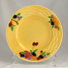 Load image into Gallery viewer, Vintage deep yellow ceramic salad or luncheon plate with colourful fruits and basketweave border edge. Produced by Carlton Ware, England, circa 1930s. We have six plates in stock. All are in excellent vintage condition, free from chips/cracks, crazing present. Stamped maker's marks Carlton Ware MADE IN ENGLAND "TRADE MARK" REGISTRATION APPLIED FOR. Measures 9-3/8"