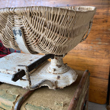 Load image into Gallery viewer, This is a fabulous vintage cast iron platform scale. The paint is chippy perfection and the wicker basket is in amazing shape considering its age. This may have been used in a grocers, or even used as a baby scale. Would look amazing in any shabby chic or farmhouse decor filled with fruits, breads or a lovely dried floral arrangement. A one-of-a-kind display piece!
In as found vintaVintage cast iron platform scale with wicker basket. Crafted by W.T. Avery Ltd., Birminage condition.
Measures 25 x 47 inches