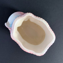 Load image into Gallery viewer, Vintage white lustreware ceramic baby bootie planter with pink bows and edge details, and a hint of blue. Crafted by Rubens Originals, Japan, 1950s. Adorable in a baby's nursery to house a small houseplant or use it to store accessories!
In excellent condition, no chips or cracks. Maker's mark.
Measures 4 x 4 x 3 inches
