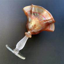 Load image into Gallery viewer, Vintage Sailboat marigold carnival glass footed pedestal compote featuring a iridescent orange ruffle-edged bowl embossed with sailboats and spiral stem. Crafted by Fenton Art Glass, USA, 1907 - 1925. A beautiful piece to add to your art glass collection!
In excellent condition, no chips.
Measures 6 x 6 inches