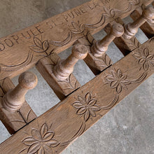 Load image into Gallery viewer, Lovingly handcrafted one-of-a-kind vintage wood wall-hung coat rack, featuring hand carved florals, the phrase "du-te dorule si spune la mandruta vorbe bune", loosely translated mean "they long for good words" and turned pegs. A true piece of old world craftsmanship to enhance your entryway, mudroom, bedroom or bath.
In as found vintage condition, missing one peg.
Measures 36 x 13 x 8 1/2 inches