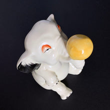 Load image into Gallery viewer, RARE FIND!!!
Adorable art deco white circus elephant balancing yellow ball porcelain figurine. Crafted by Crown Devon, England, 1920s/30s. Perfect for elephant collectors. Also makes a whimsical decor feature in a child's room.
In great vintage condition, no chips/cracks/repairs, minor paint loss. Marked Made in England.
Measures 4 x 5 1/2 inches
